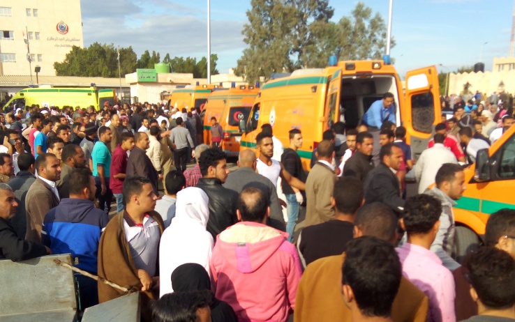Egyptians gather around ambulances following a gun and bombing attack on the Rawda mosque near the North Sinai provincial capital of El-Arish on November 24, 2017.
Armed attackers killed at least 235 worshippers in a bomb and gun assault on the packed mosque in Egypt's restive North Sinai province, in the country's deadliest attack in recent memory.   / AFP PHOTO / -        (Photo credit should read -/AFP/Getty Images)