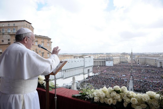 This handout picture released by the Vatican press office shows Pope Francis delivers the ''Urbi et Orbi'' message and blessing to faithful after the Easter Holy Mass at St Peter's square, Vatican City, 31 March 2013.   
ANSA/OSSERVATORE ROMANO
+++EDITORIAL USE ONLY - NO SALES+++
